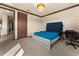 Bedroom with a chandelier, desk, carpeted floors and ensuite bathroom at 3041 Boating Blvd, Kissimmee, FL 34746