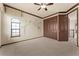 Cozy carpeted bedroom with ceiling fan, trim, and large closet at 3041 Boating Blvd, Kissimmee, FL 34746