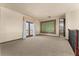 Bonus room on the second level with plush neutral carpet and a set of french doors at 3041 Boating Blvd, Kissimmee, FL 34746