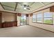 Bonus room with wet bar, custom ceiling, windows, and sliding glass doors to balcony at 3041 Boating Blvd, Kissimmee, FL 34746
