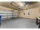 Spacious two-car garage with garage door, ample space for parking and storage at 3041 Boating Blvd, Kissimmee, FL 34746