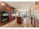 Spacious kitchen featuring stainless steel appliances, granite countertops, and an island with bar seating at 3041 Boating Blvd, Kissimmee, FL 34746