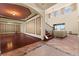 Open-concept living room with hardwood floors and archway to the Gathering room at 3041 Boating Blvd, Kissimmee, FL 34746