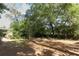 Expansive backyard featuring mature trees and a peaceful setting at 317 White Oak Dr, Altamonte Springs, FL 32701