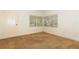Bright living room with large windows, neutral carpet, and a white door at 317 White Oak Dr, Altamonte Springs, FL 32701