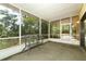 Relaxing screened-in patio area with an outdoor view at 317 White Oak Dr, Altamonte Springs, FL 32701