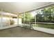 Spacious screened-in patio with views of the lush backyard at 317 White Oak Dr, Altamonte Springs, FL 32701