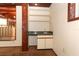 Convenient wet bar area with a sink and storage, ideal for entertaining guests at 317 White Oak Dr, Altamonte Springs, FL 32701