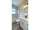 Beautiful bathroom with tub, shower, new vanity with quartz countertops at 331 N Dollins Ave, Orlando, FL 32805