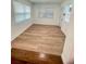Bright living room with wood floors and ample natural light at 331 N Dollins Ave, Orlando, FL 32805