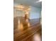 Beautiful open-concept home design featuring hardwood floors connecting living and kitchen at 331 N Dollins Ave, Orlando, FL 32805