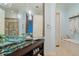 Serene bathroom with decorative sink, modern faucets, and bench seat, great for relaxing at 3512 Legacy Hills Ct, Longwood, FL 32779