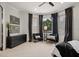 Bright bedroom showcasing a bay window, seating, and modern decor for comfortable living at 3512 Legacy Hills Ct, Longwood, FL 32779
