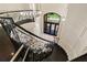 Elegant foyer with spiral staircase, chandelier, and ornate ironwork at 3512 Legacy Hills Ct, Longwood, FL 32779