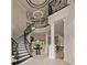 Grand foyer showcasing a curved staircase, high ceilings, and elegant chandelier at 3512 Legacy Hills Ct, Longwood, FL 32779