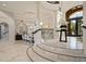 Stunning home featuring a grand foyer with stairs leading to an open dining area at 3512 Legacy Hills Ct, Longwood, FL 32779