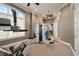 Well-equipped home gym featuring exercise equipment and natural light at 3512 Legacy Hills Ct, Longwood, FL 32779
