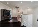 Upstairs loft area featuring a TV entertainment center and comfortable seating at 3512 Legacy Hills Ct, Longwood, FL 32779