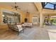 Covered patio with elegant columns and plenty of seating at 3512 Legacy Hills Ct, Longwood, FL 32779