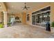 Expansive covered patio with outdoor fireplace and view of the pool at 3512 Legacy Hills Ct, Longwood, FL 32779
