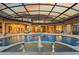A stunning pool area with a spa and water features creates a resort-like atmosphere for relaxation and enjoyment at 3512 Legacy Hills Ct, Longwood, FL 32779