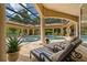 The outdoor patio with lounge chairs overlooks the stunning pool and spa area, perfect for relaxation and entertainment at 3512 Legacy Hills Ct, Longwood, FL 32779