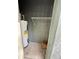 Utility closet featuring a water heater and storage shelf, ensuring efficient space utilization at 3549 Wilshire Way Rd # 56, Orlando, FL 32829