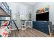 bedroom featuring a bunk bed and desk with lots of natural light at 4737 Maple Park St, Orlando, FL 32811