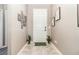 Bright foyer features tile flooring and neutral decor at 4737 Maple Park St, Orlando, FL 32811