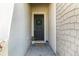 Inviting front door with wreath and potted plants, creating a warm welcome at 4737 Maple Park St, Orlando, FL 32811