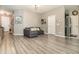 Comfortable living area showcases stylish decor and wood flooring at 4737 Maple Park St, Orlando, FL 32811
