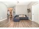 Comfortable living area showcases stylish decor and wood flooring at 4737 Maple Park St, Orlando, FL 32811