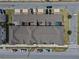 Birds eye view of townhomes with enclosed patios, parking, and landscaping at 5119 Jones Rd, St Cloud, FL 34771