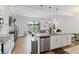 Spacious kitchen flowing into the living area, with a large island and modern amenities at 5119 Jones Rd, St Cloud, FL 34771