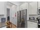 Kitchen with stainless steel appliances and granite countertops at 5119 Jones Rd, St Cloud, FL 34771