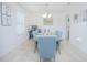 Bright dining room with comfortable seating, natural light, and modern decor at 5151 Preserve Blvd, St Cloud, FL 34772