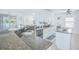 Modern kitchen with stainless steel appliances, granite countertops, and white cabinetry at 5151 Preserve Blvd, St Cloud, FL 34772
