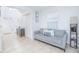 Cozy living room with comfortable seating, bright light, tile floors, and decor at 5151 Preserve Blvd, St Cloud, FL 34772