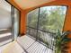 Screened-in balcony with access from the living room, perfect for enjoying the view at 6169 Metrowest Blvd # 308, Orlando, FL 32835