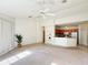 Open floor plan, showcasing the living area and kitchen space at 6169 Metrowest Blvd # 308, Orlando, FL 32835