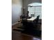 Elegant dining room featuring a formal dining table, chandelier, and large window for natural lighting at 6800 Se 12Th Pl, Ocala, FL 34472