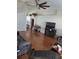 Spacious living room featuring hardwood floors, vaulted ceilings, and a ceiling fan at 6800 Se 12Th Pl, Ocala, FL 34472
