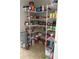 Well-organized pantry with wire shelving, maximizing storage space for groceries and household items at 6800 Se 12Th Pl, Ocala, FL 34472