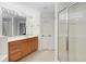 Bright primary bathroom with a glass shower at 6941 Piazza St, Orlando, FL 32819