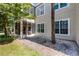 Exterior side view featuring the screened porch and well-maintained landscaping at 6955 Della Dr # 41, Orlando, FL 32819