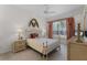Comfortable main bedroom featuring stylish decor and ample natural light at 6955 Della Dr # 41, Orlando, FL 32819