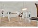 Spacious living room features tile floors, fireplace, high ceilings, and stylish accents at 6969 Edgeworth Dr, Orlando, FL 32819