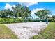 A well-maintained sand volleyball court provides recreational fun, perfect for outdoor gatherings at 6969 Edgeworth Dr, Orlando, FL 32819