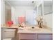 This cozy bathroom has decorative accents and a large mirror at 7323 Cypress Grove Rd # 87, Orlando, FL 32819