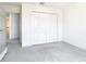 Bedroom showcasing a closet with bi-fold doors at 7323 Cypress Grove Rd # 87, Orlando, FL 32819